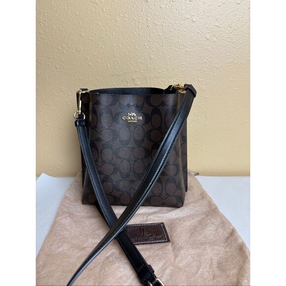 Coach Signature Bucket Crossbody Bag (Style No. NF2224) - Picture 1 of 15